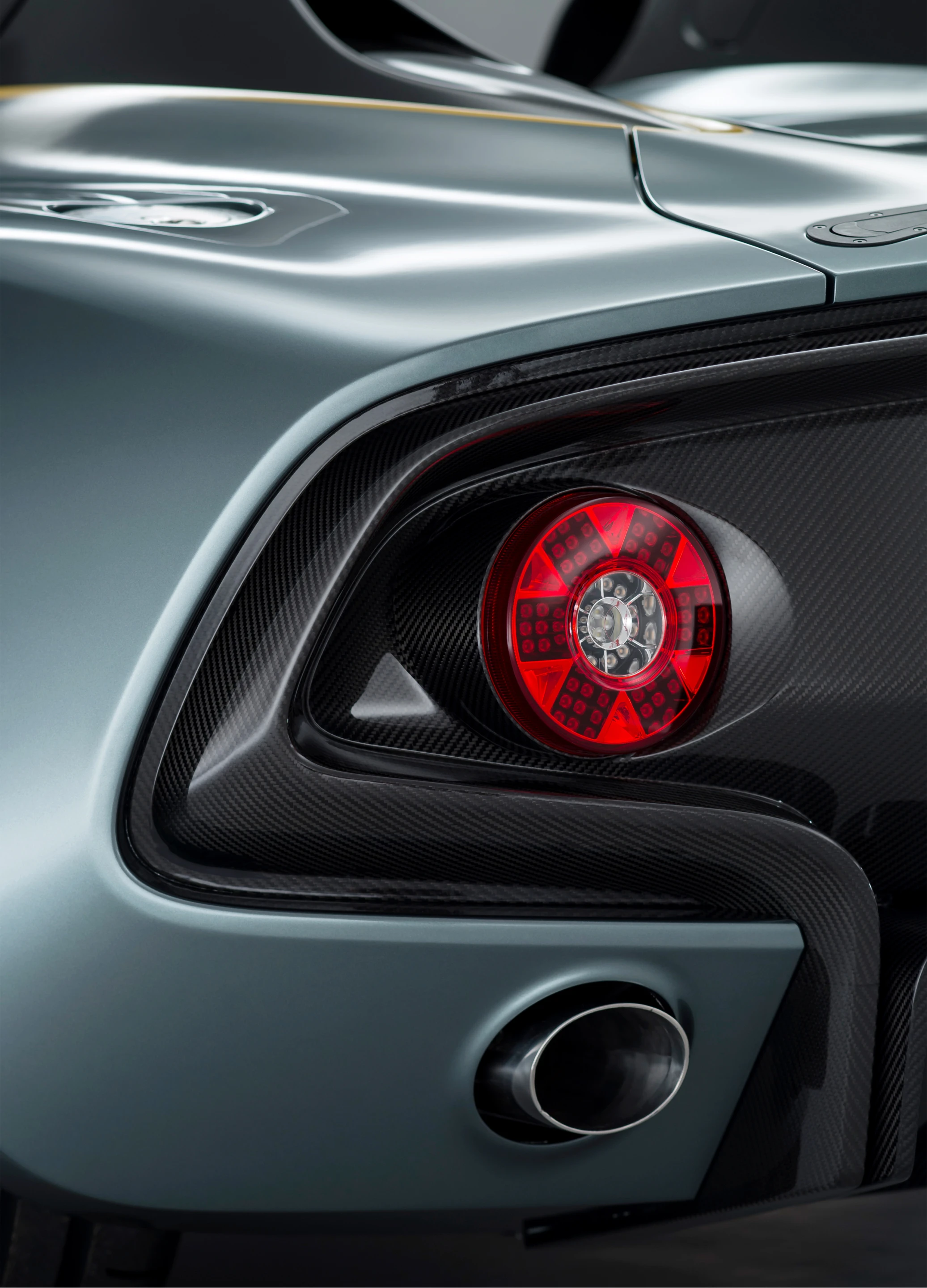 Diffuser and rear verticals incorporate carbon fiber for weight reduction and enhanced coolness factor