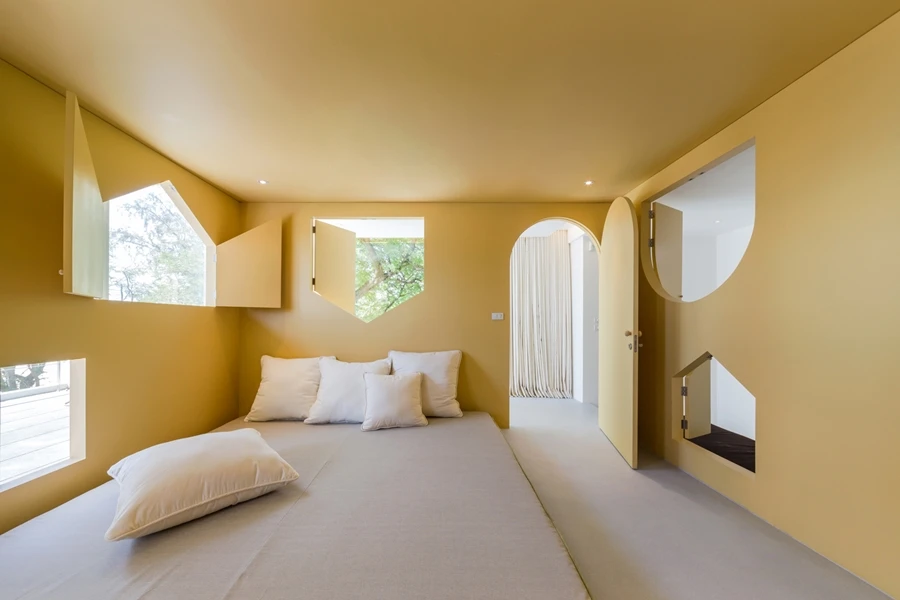 Windows are placed at different levels and locations throughout a room