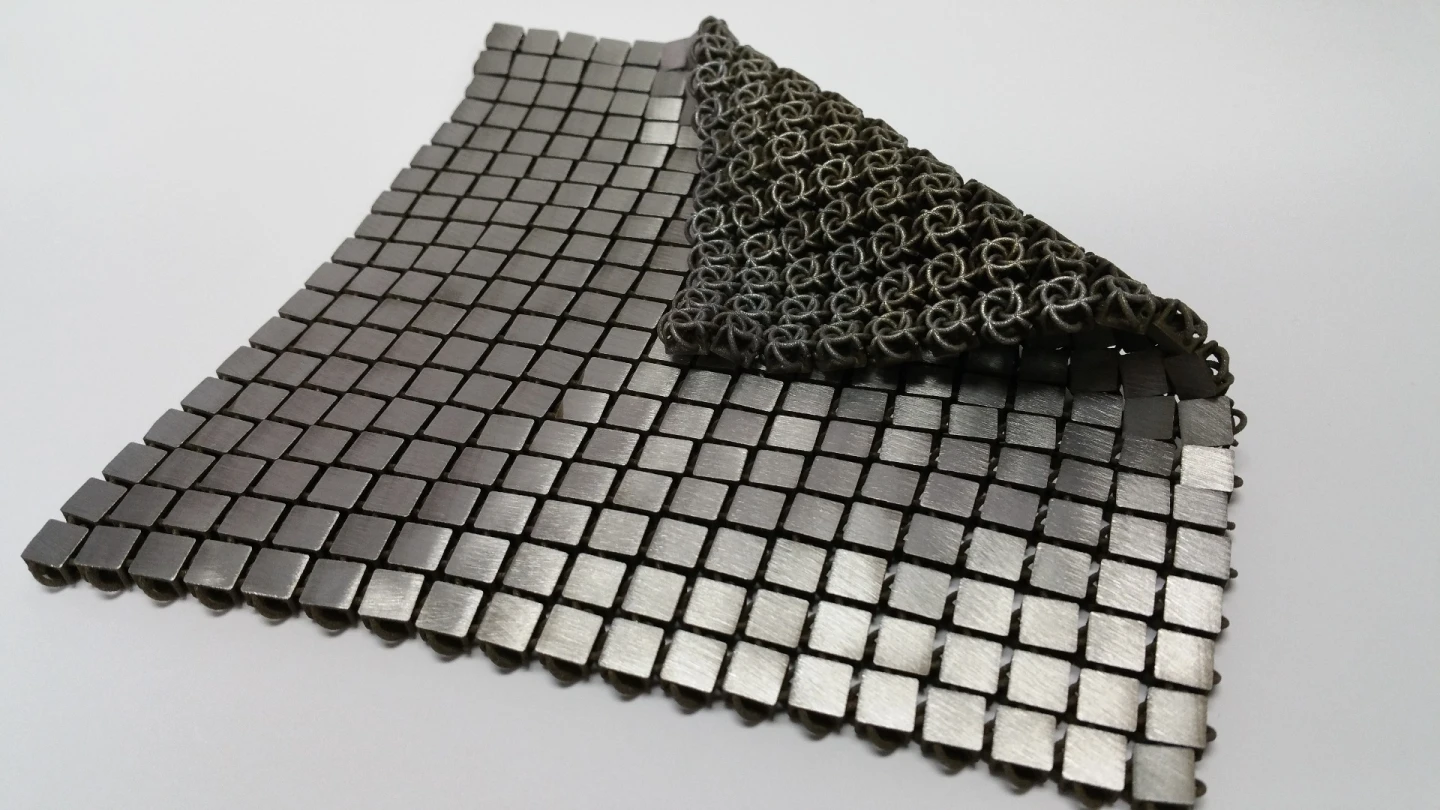 The bottom and top sides of the space fabric are designed to have different properties