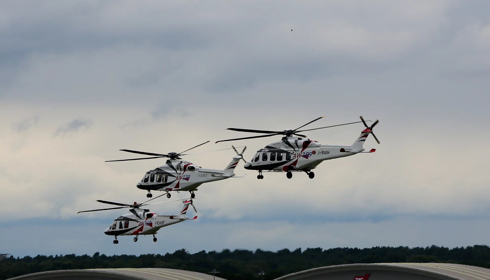 AgustaWestland helicopters AW139, AW169 and AW189 flying in close-formation (Photo: Gizmag)