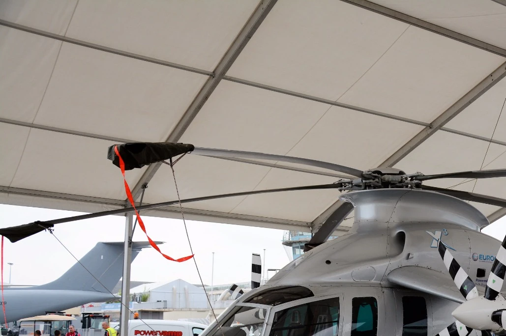 A Eurocopter X3 hybrid helicopter demonstrator tucked away behind the main static displays at the Paris Air Show