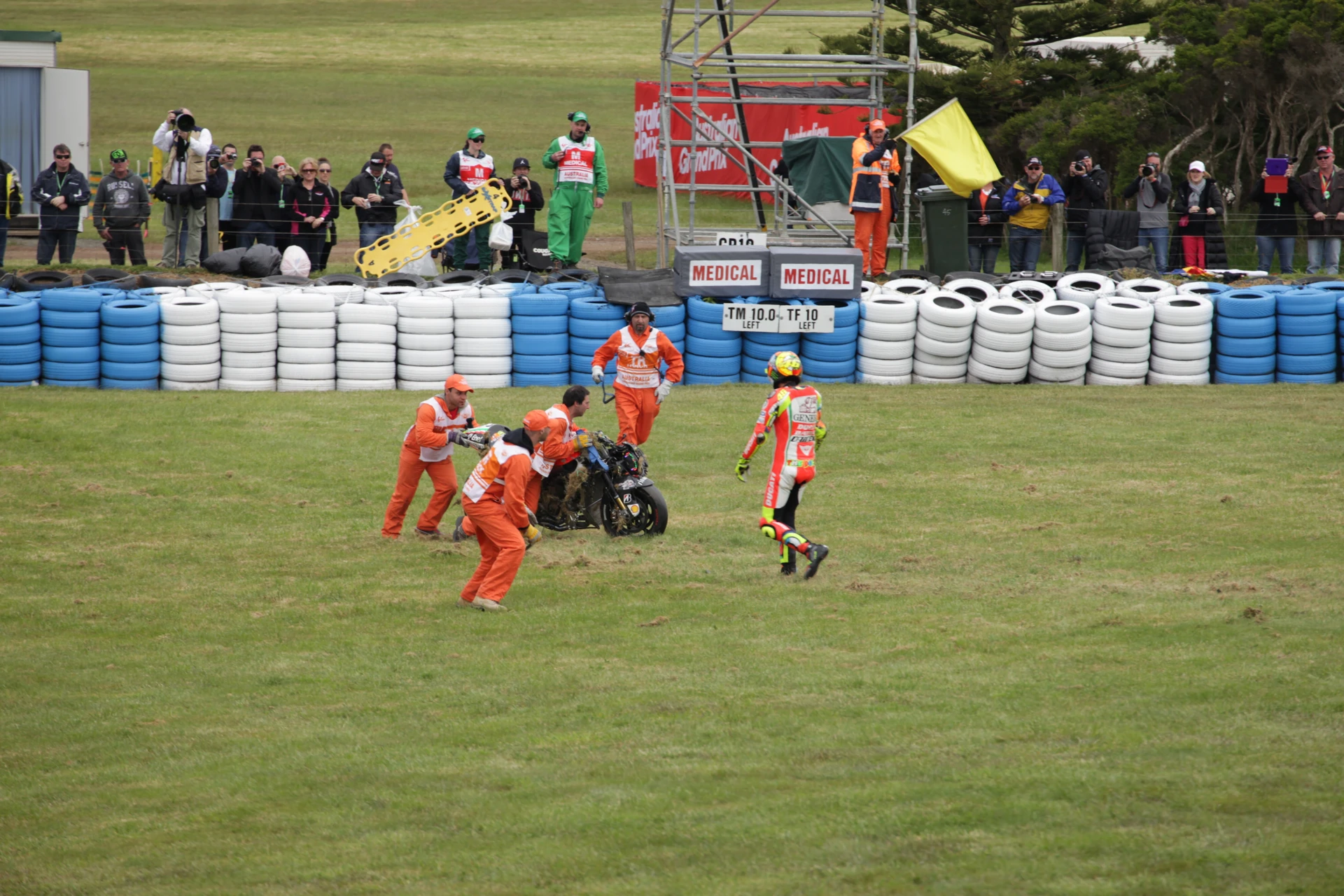 Rossi sends his motorcycle down the road during warm up practice