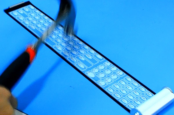 Since all the electronic components are printed flat and made of water and dirt resistant materials, the keyboard can survive drink spills and even being hit with a hammer