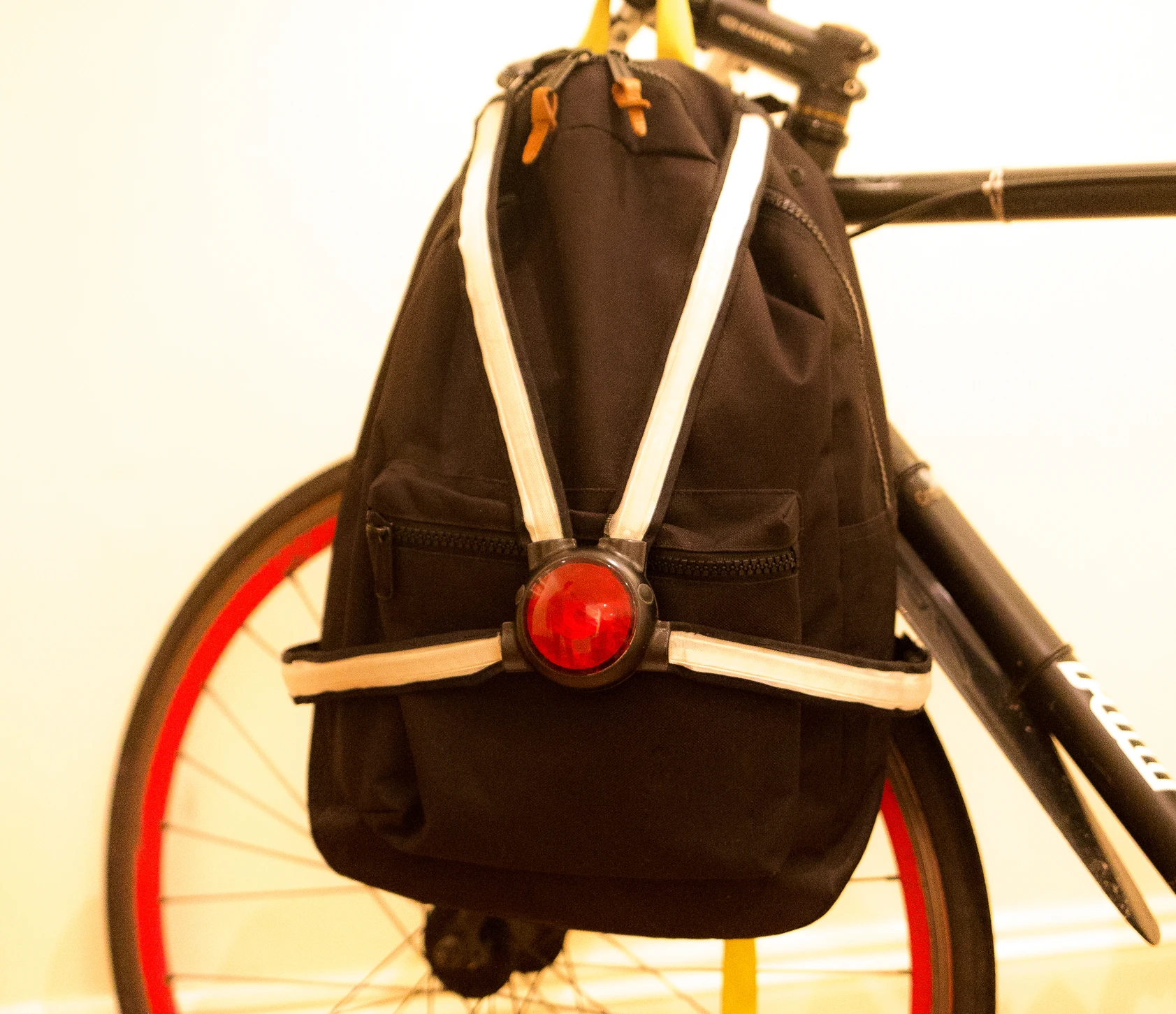 The Commuter X4 can be worn on the back, or around a backpack