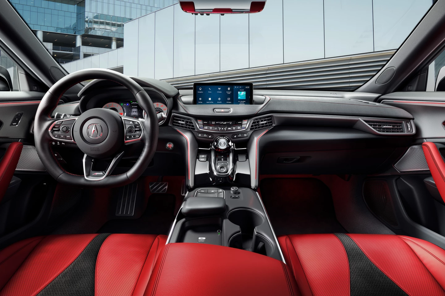 Acura helps cast the focus on the driver position with the broad center tunnel and wraparound instrument panel