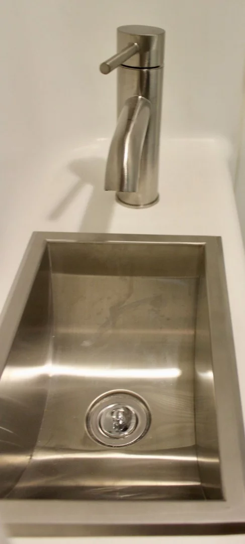Slim stainless steel bathroom sink in the Winnebago Boldt Q70 KL