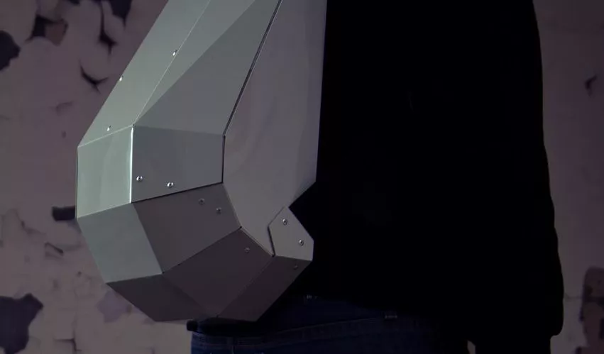 The Solid Gray backpack features a rigid foldable design, and is made from a single sheet of copolymer