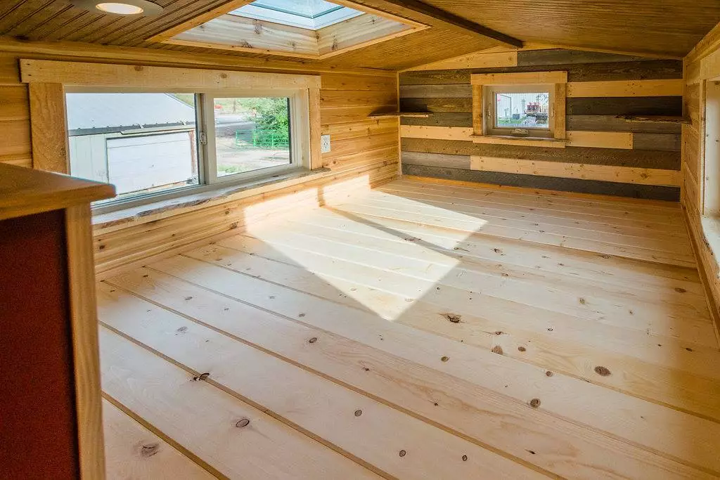 The loft bedroom in Davis's 22 ft Off-Grid Tiny Home