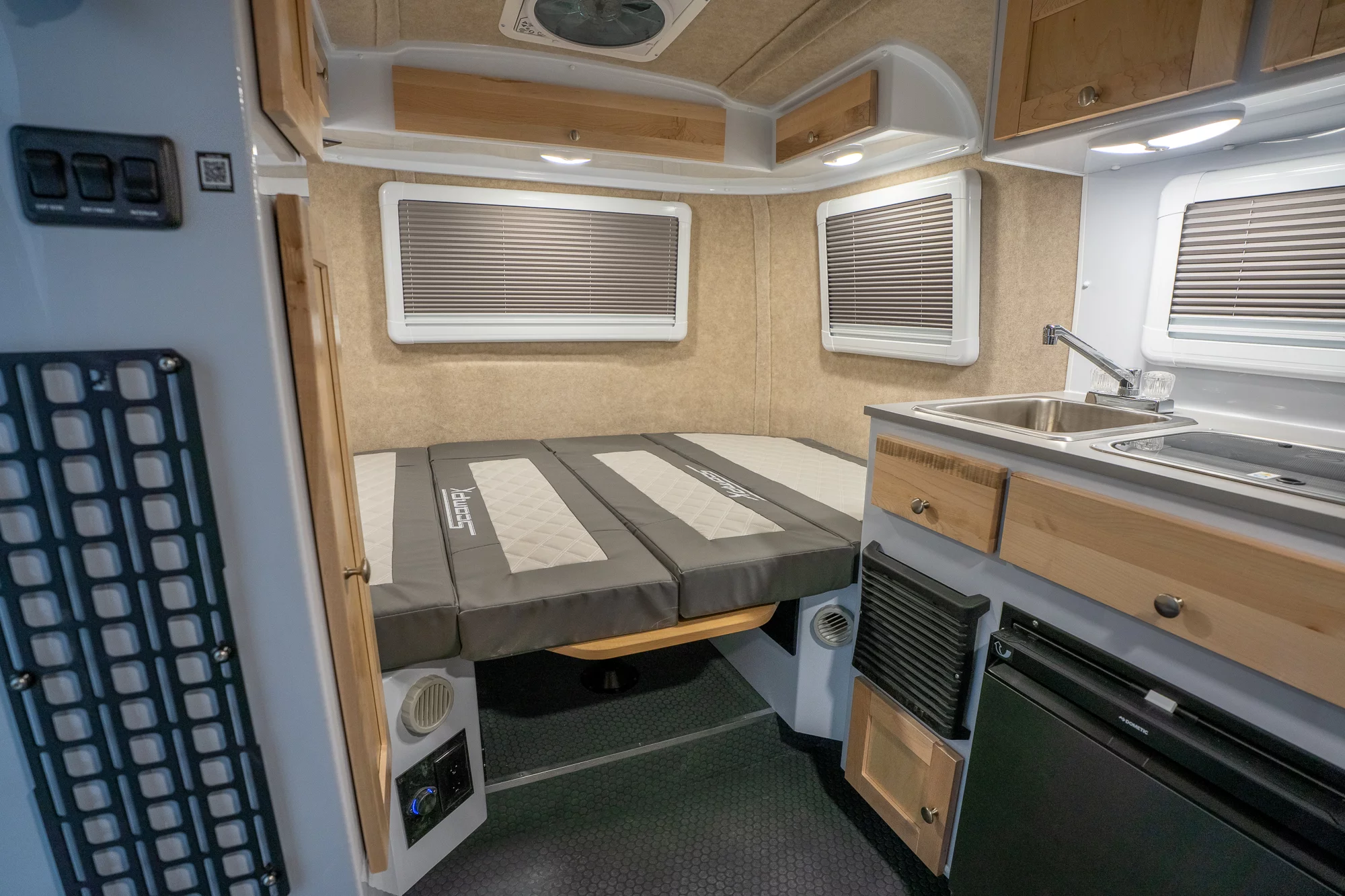 The main double bed measures 54 x 76 in