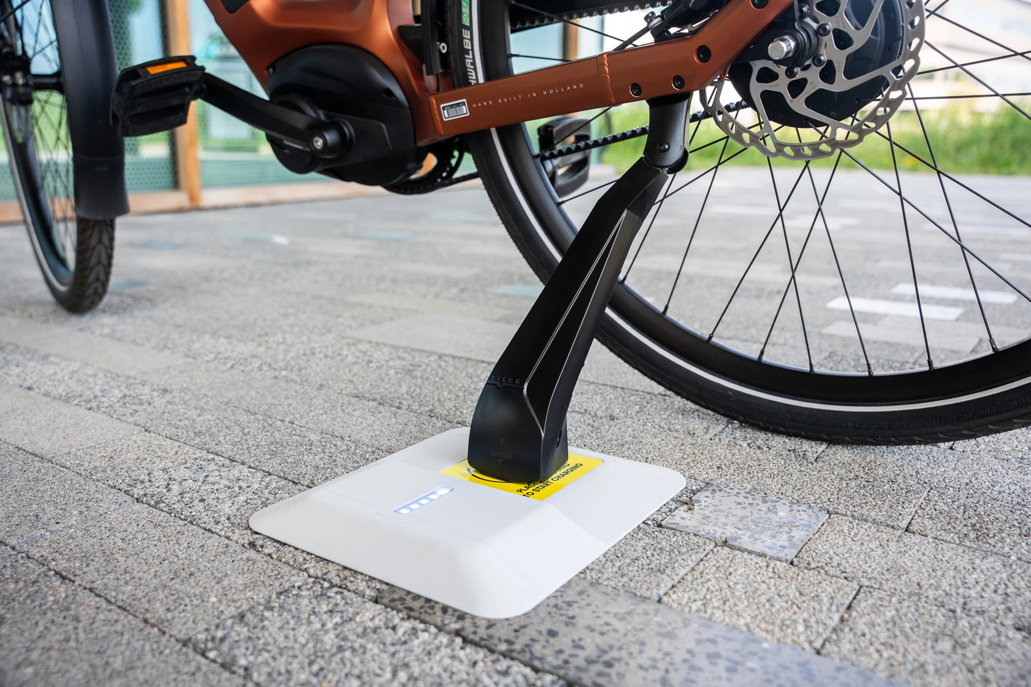 Wireless charging pads make phone charging more convenient, the Tiler Compact aims to do the the same for ebikes