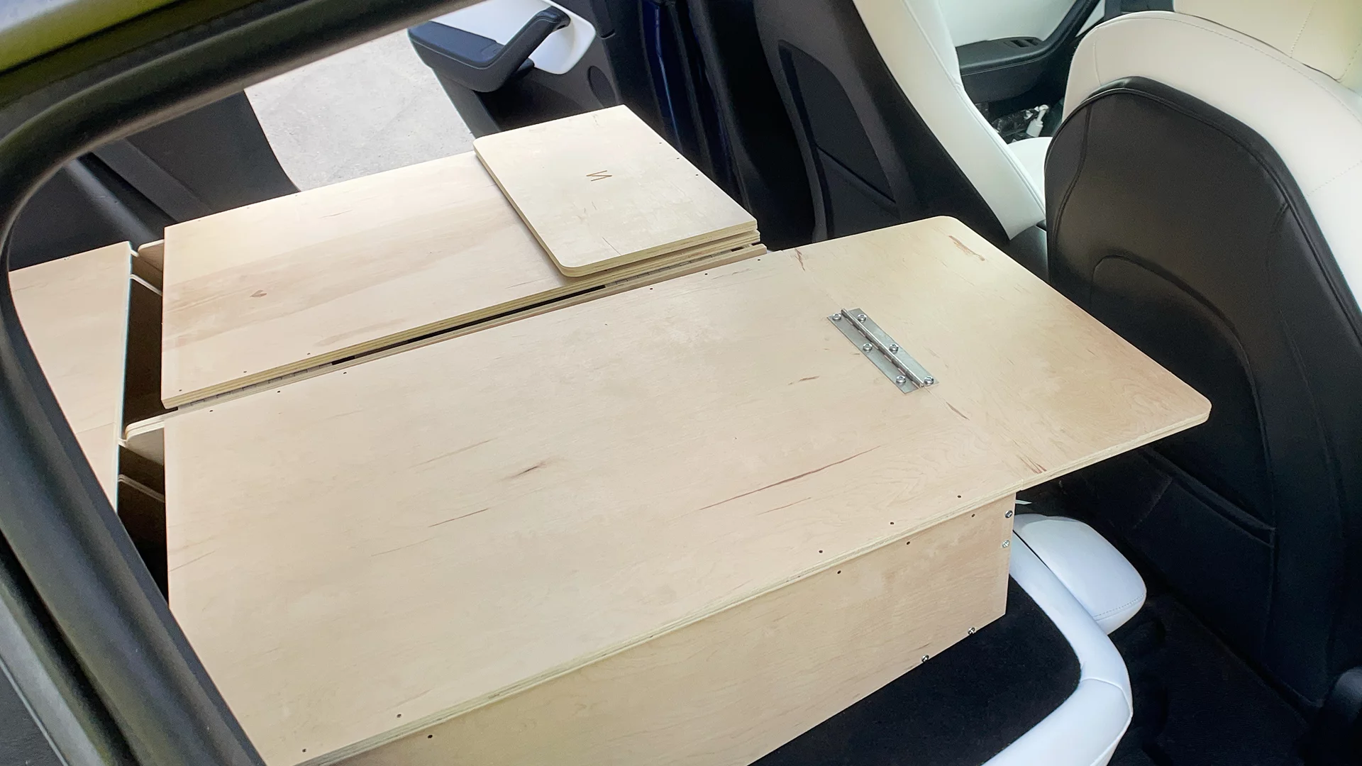 Extensions on the front box lids support a mattress when needed