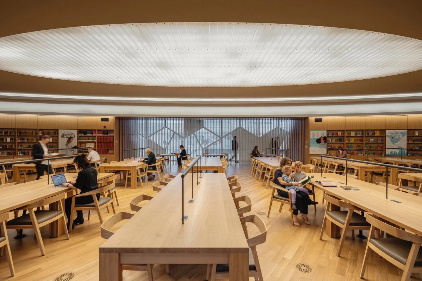 Calgary Central Library's material palette is a simple mixture of wood, glass and concrete