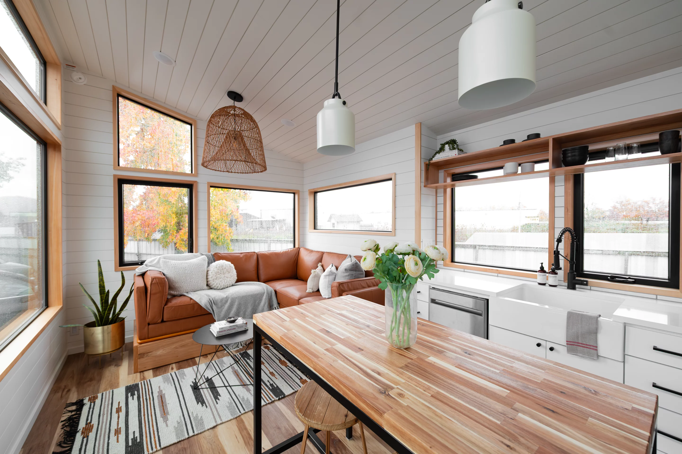 The Urban Park Max 37's living room includes a large L-shaped sofa