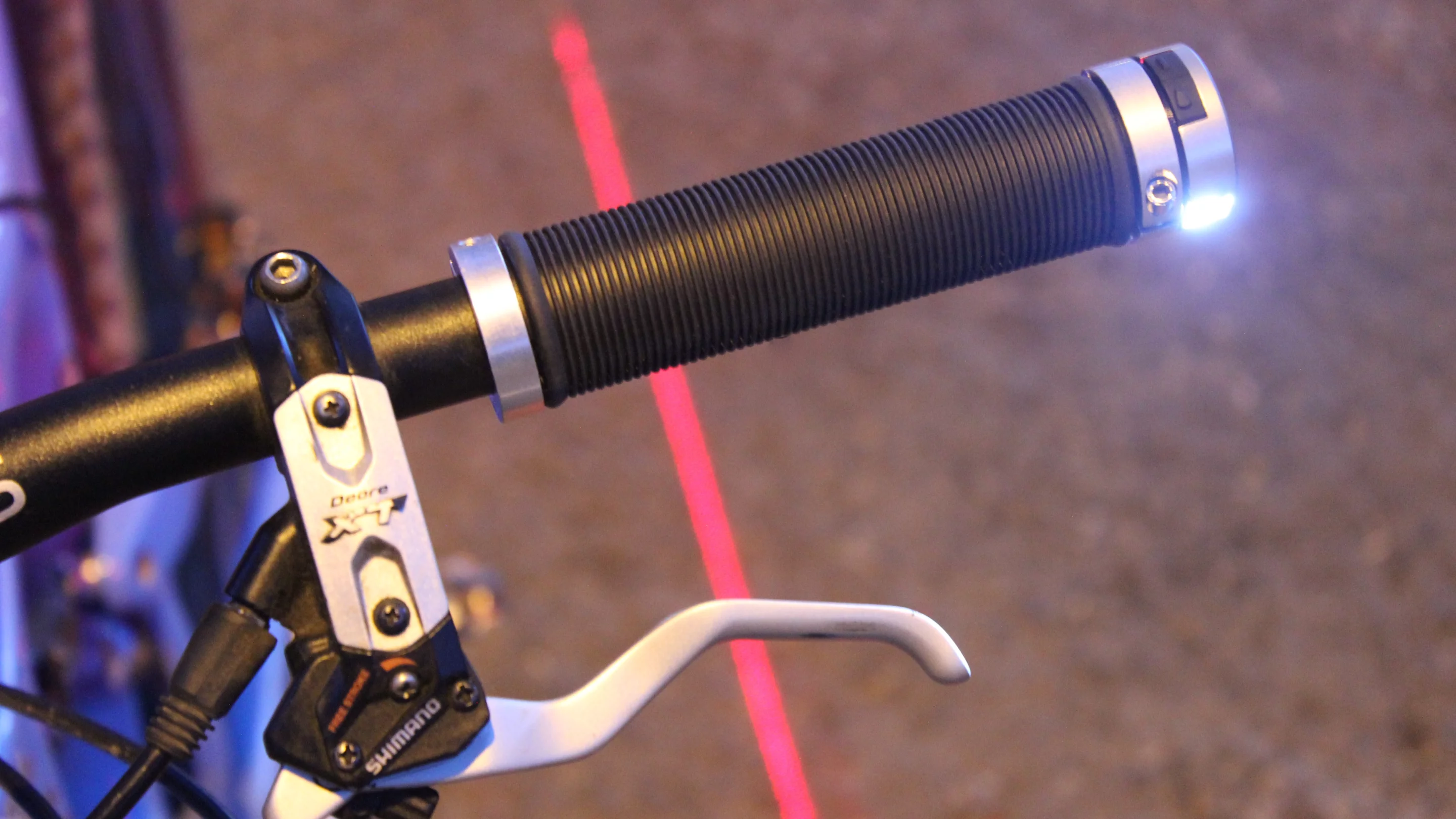 Lumma combines handlebar grips with headlights, tail lights and laser lane markers