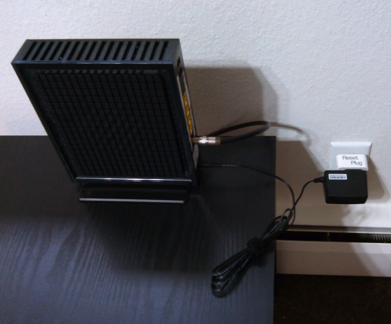SmartPlug connected to an all-in-one modem and router