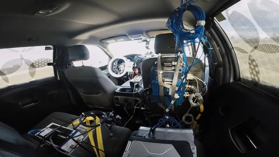 The robotic driving system is designed to be added into any vehicle without requiring refitting of vehicle components