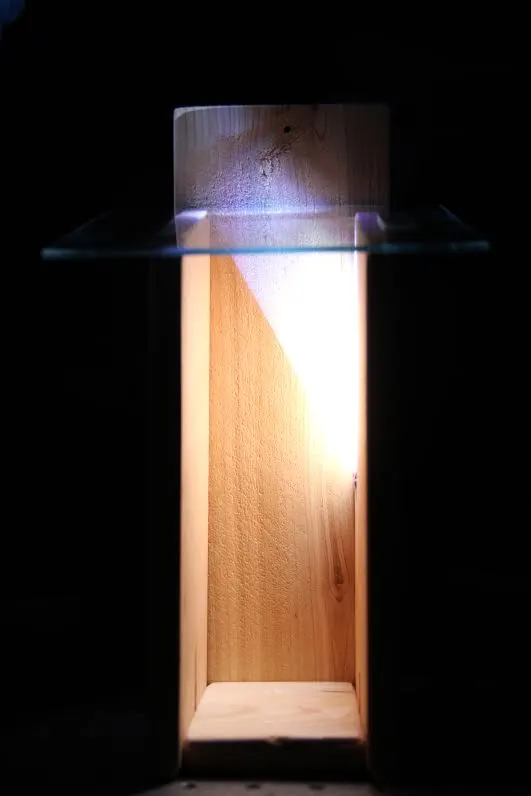 The wooden window was much better at eliminating glare and more evenly distributing light, compared to glass window (pictured here)