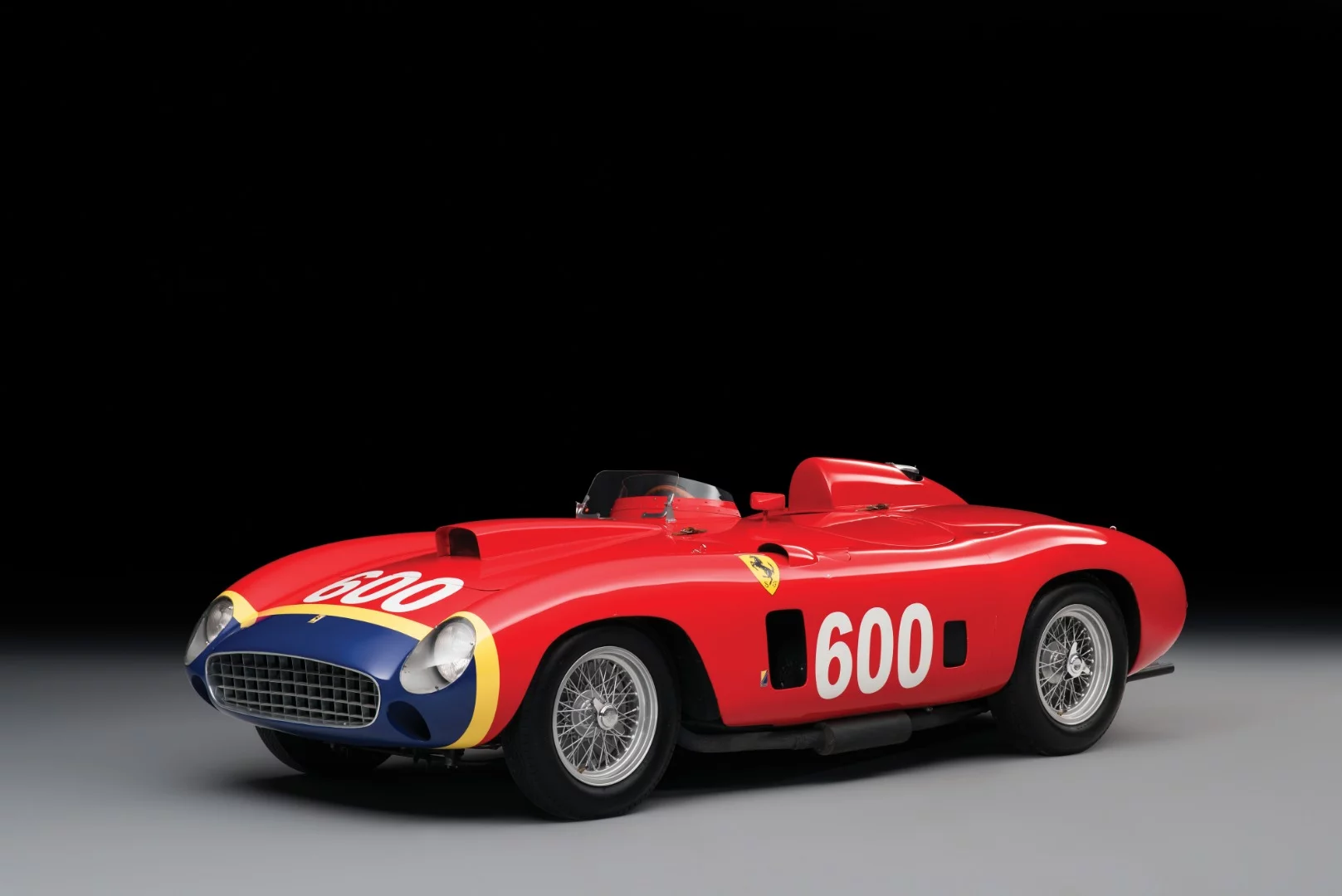In 2015, a 1956 Ferrari 290 MM sold for $28,050,000 in New York. Only four were ever made, and this one was driven by the best driver in history too. That's Fangio poised at 6:00 am for the start of the Mille Miglia in this car.