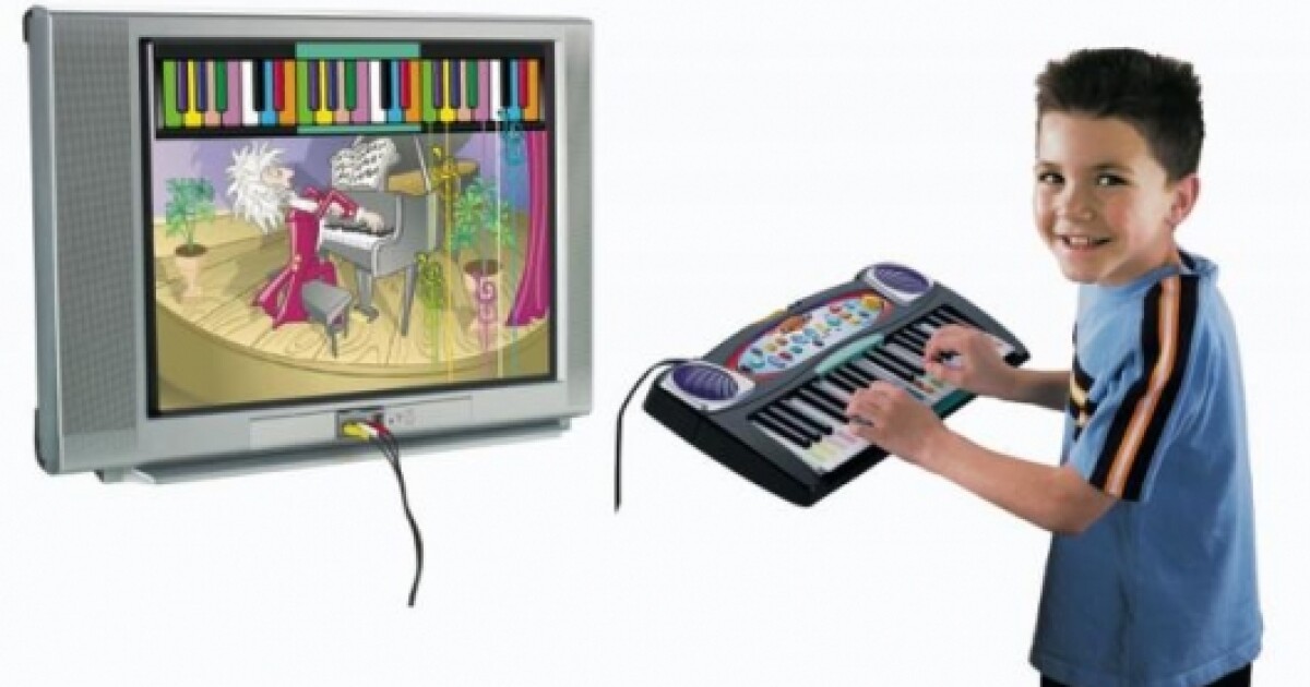 Learning to read and play music via a video game