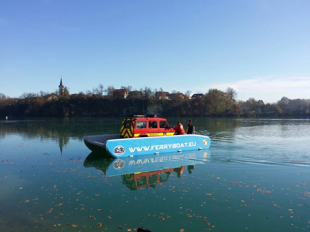 The Hovercraft Ferryboat transporting a vehicle across a lake