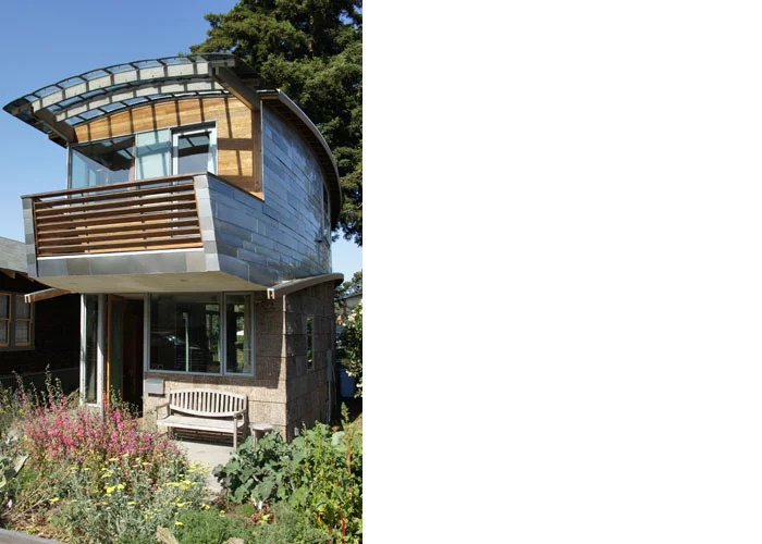The upper outside walls of the McGee house are made from over 100 salvaged car roofs