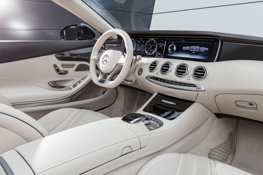 The S 65 Cabriolet displays information on two animated round dials on a 31.2-cm (12.3-in), high-resolution color display
