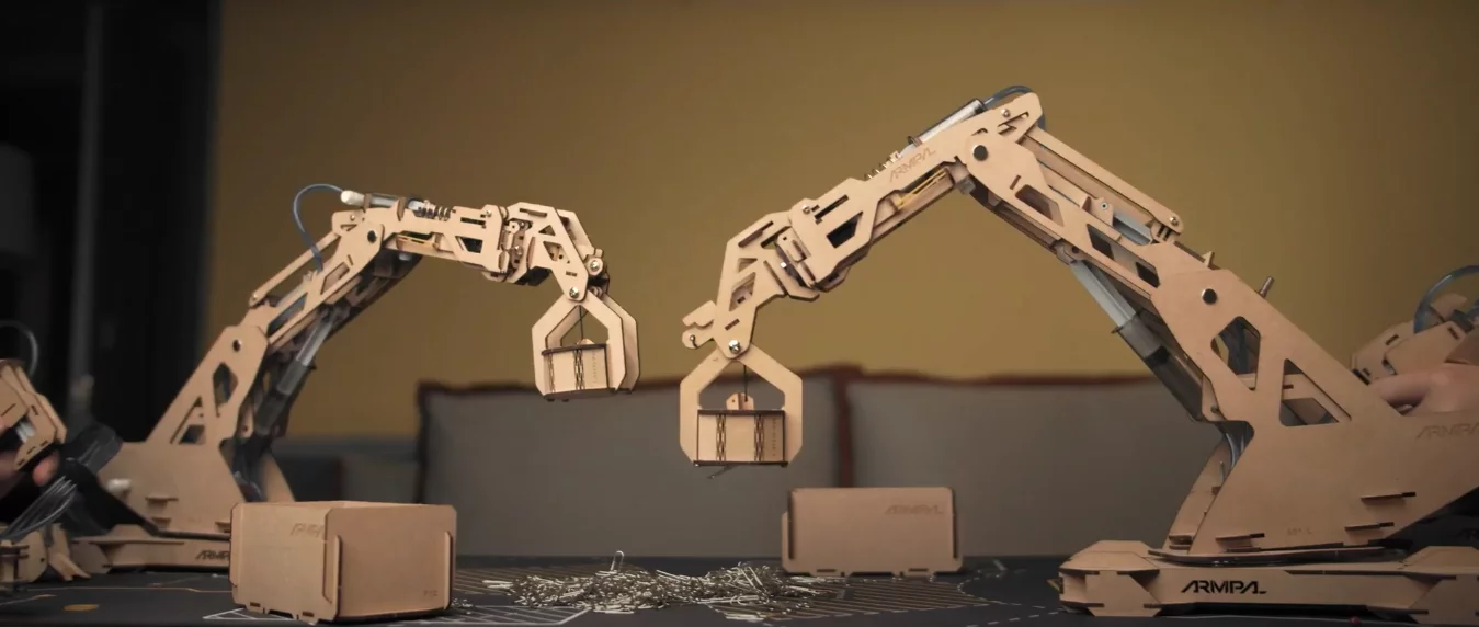 One of ArmPal's optional extras is a magnetic crane that can pick up thing like paper clips