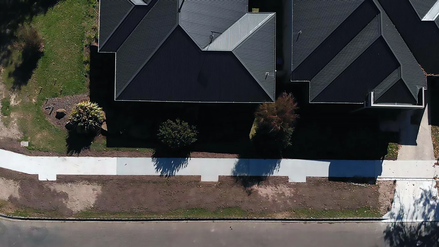 An aerial shot of the different concretes laid: standard concrete (left), concrete with wood chip biochar (middle) and with coffee biochar (right)