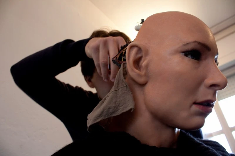 Thirty-two servo motors are integrated in the android skull and neck