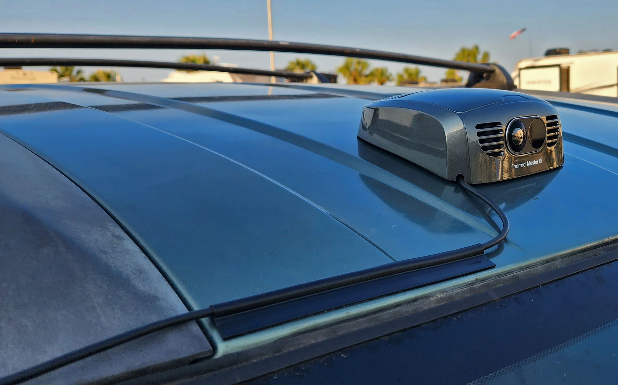 Yep ... that's not coming off. In about a thousand miles of driving, it hasn't budged