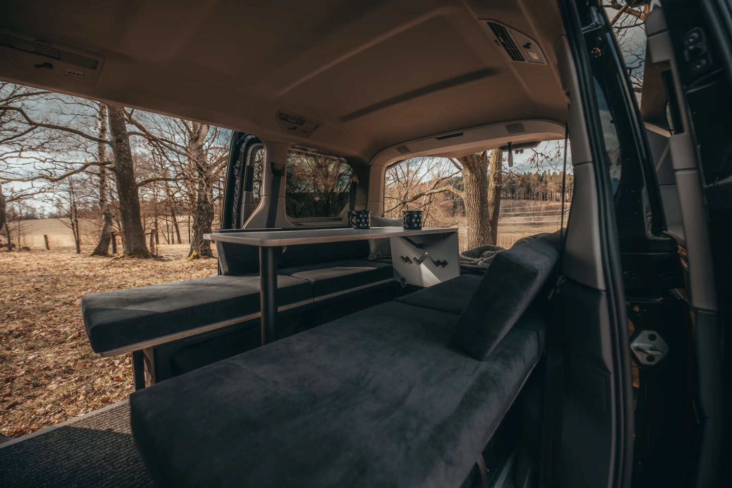 When it's not holding cushions, the center panel lifts up and becomes a table