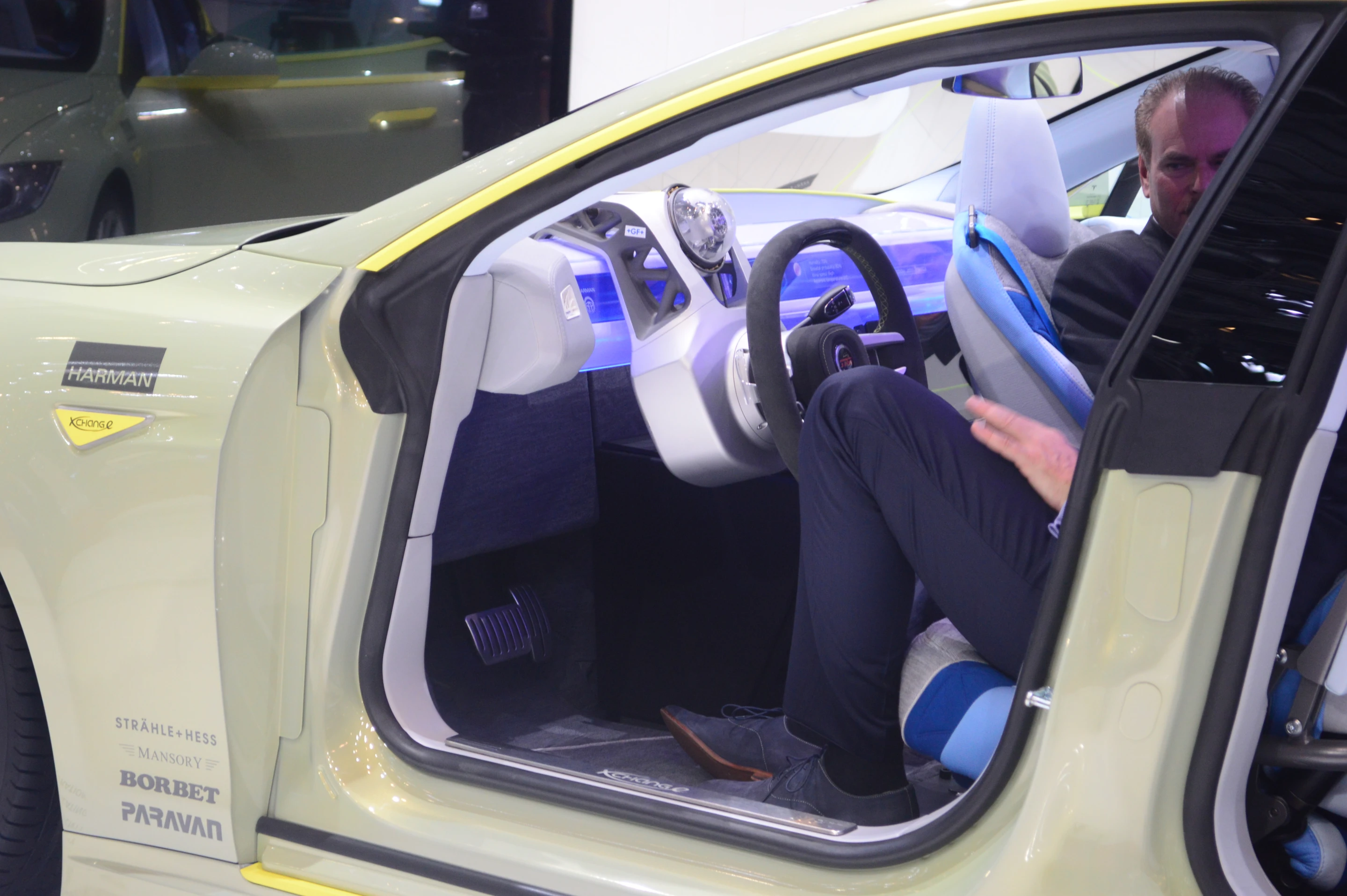 Because the Rinspeed XchangE has steer-by-wire hardware, the steering wheel can slide across the dashboard