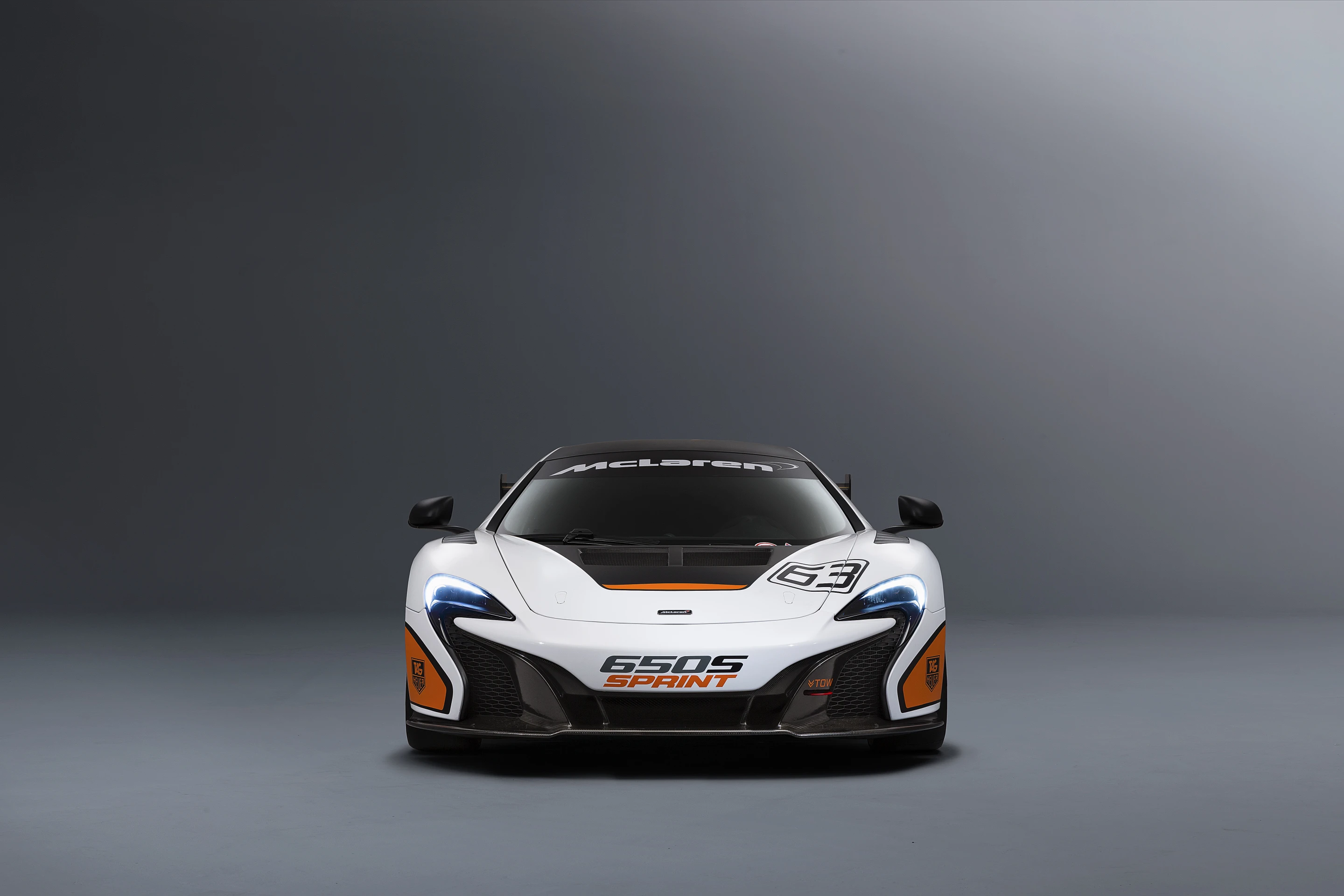 A GT3 hood with integrated ductwork, plus a forward chin spoiler and big rear wing help finish out the car’s track regimented motif