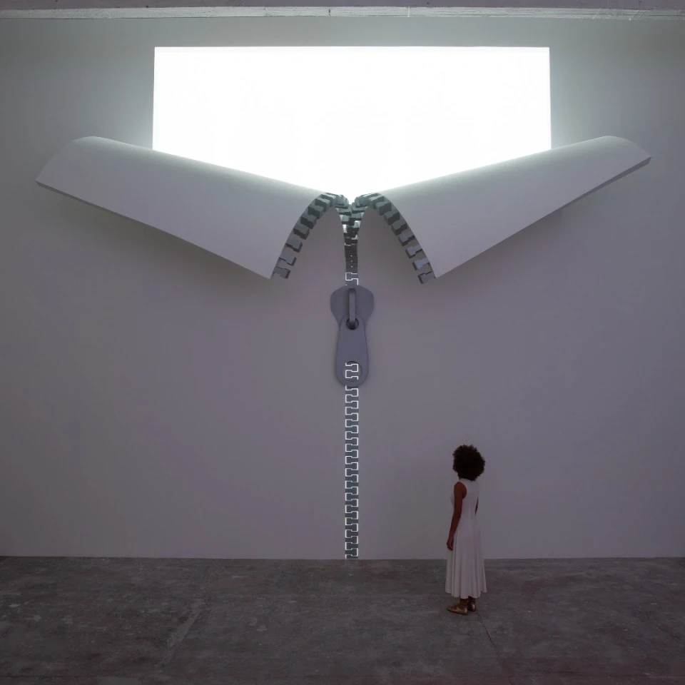 The interior of IQOS World includes another zip installation on the wall