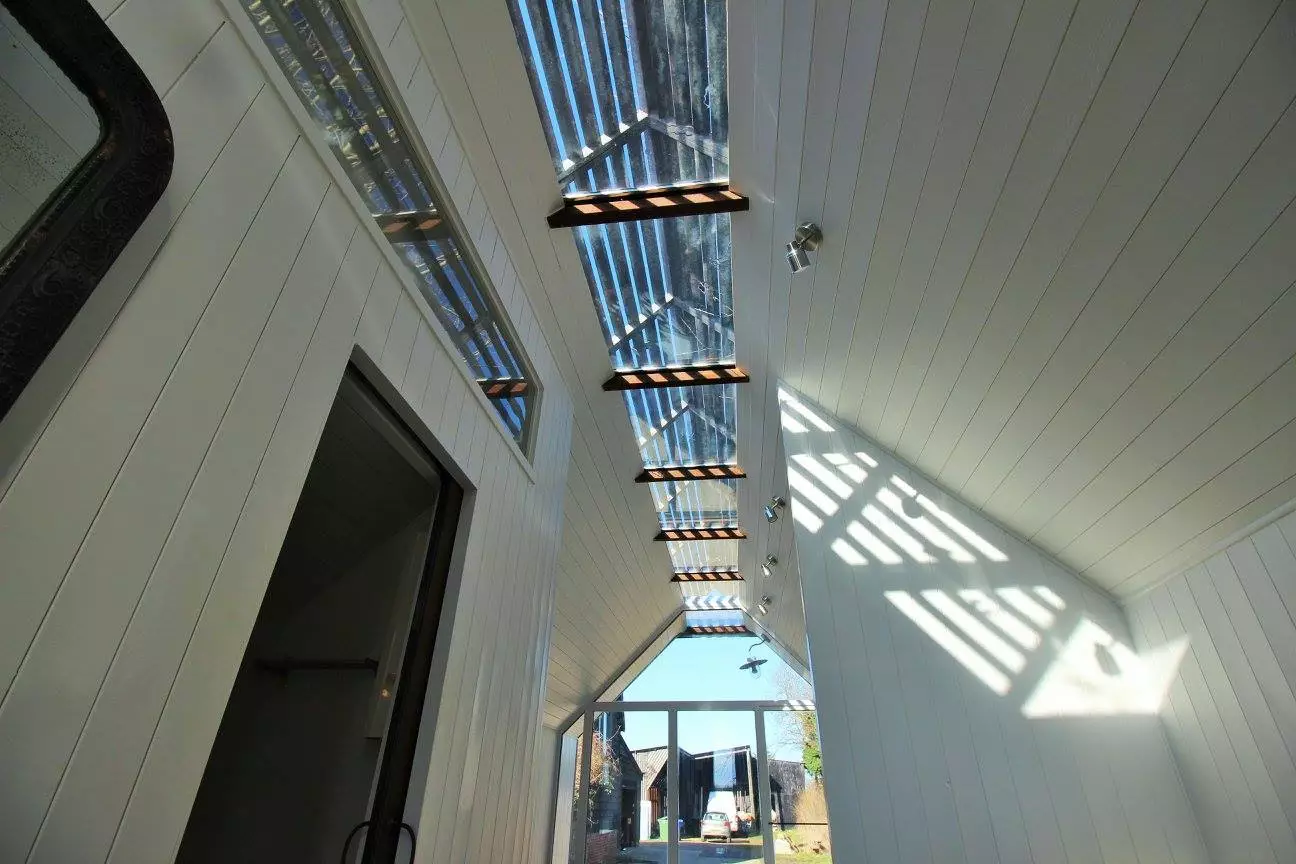 The skylight should offer plenty of natural daylight and the slats ensure it doesn't turn into a greenhouse