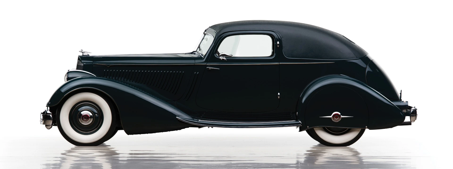 <p>This 1934 Packard Twelve Sport Coupe by LeBaron (Lot 221) is the last of just four built, and was the 1934 New York Show car. Having been such a significant car in Packard's history, the car has a complete history from new and has been in many prominent collections at different times during it's eighty year existence.</p><p>Restored in the early 1980s, it won a 1983 AACA National First Prize badge and a CCCA National First Prize badge. <span>This highly regarded Sport Coupe is also featured in Hugo Pfau’s The Custom-Bodied Packard, Dennis Adler’s Packard, Beverly Rae Kimes’s Packard: A History of the Motor Car and the Company, and Michael Lamm and Dave Holls’s A Century of Automotive Style. </span></p><p>Estimated at $1,600,000-$2,500,000, the Packard New York Sport sold for $2,200,000.</p>