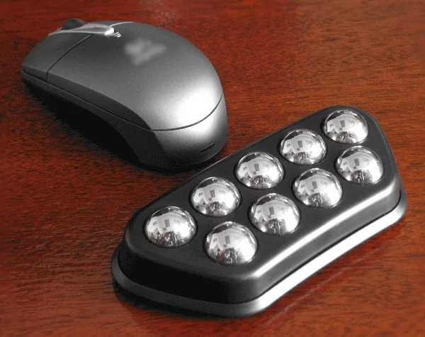 The Ergoroller computer wrist support massages your wrist as you use it