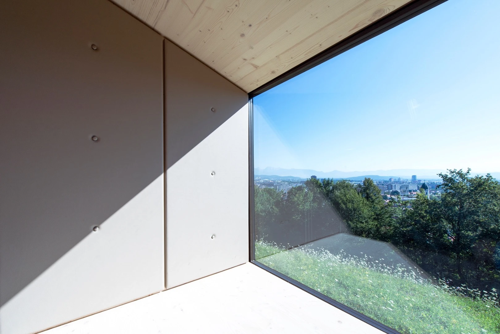 Living Unit on Ljubljana Castle offers multiple views thanks to its generous glazing