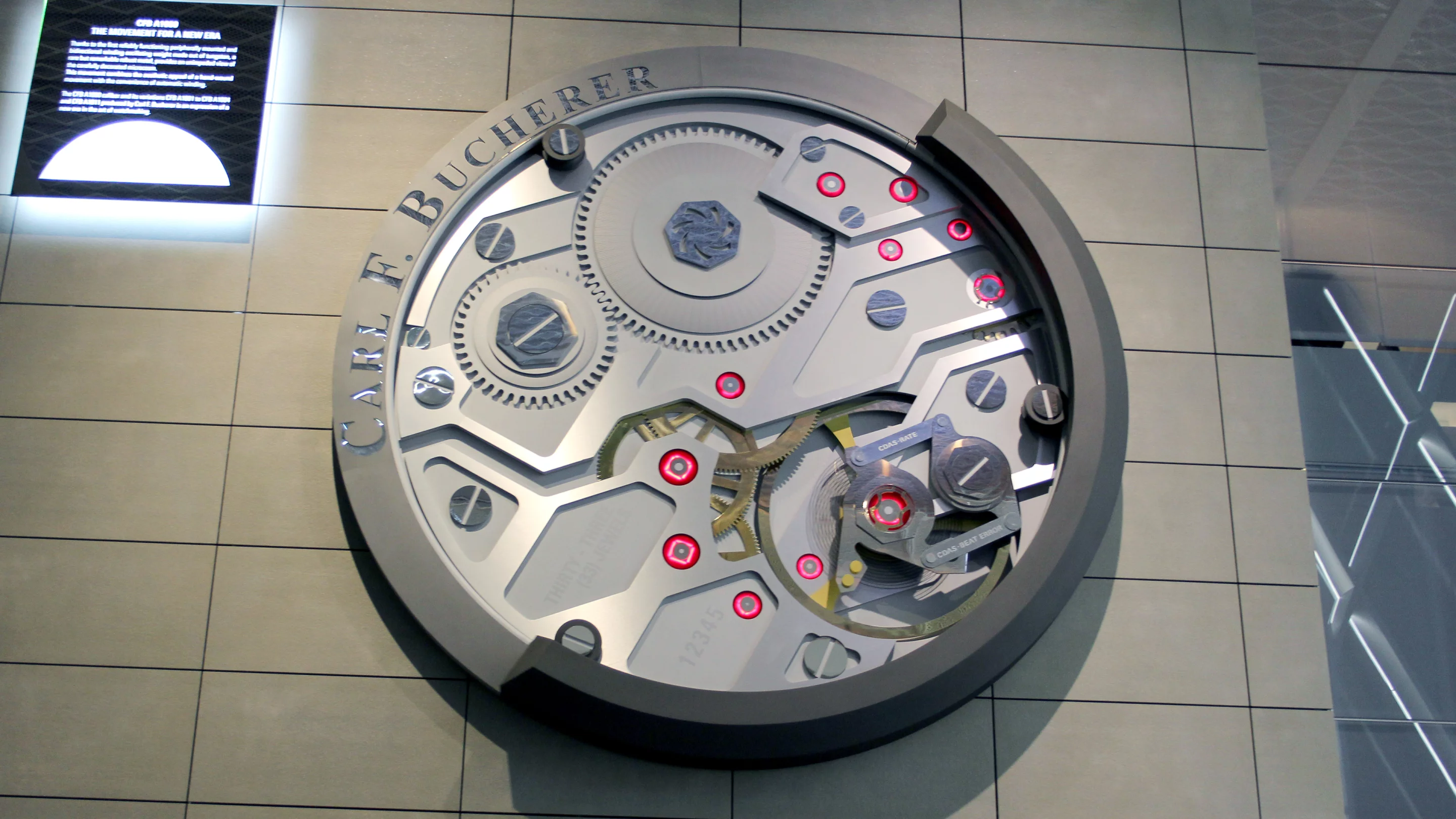 Carl Bucherer had a large scale version of its CFB1000 movement on the side of its booth. According to the company, the movement is designed to combine "the aesthetic appeal of a hand-wound movement with the convenience of automatic winding." (Photo: Chris Wood/Gizmag.com)