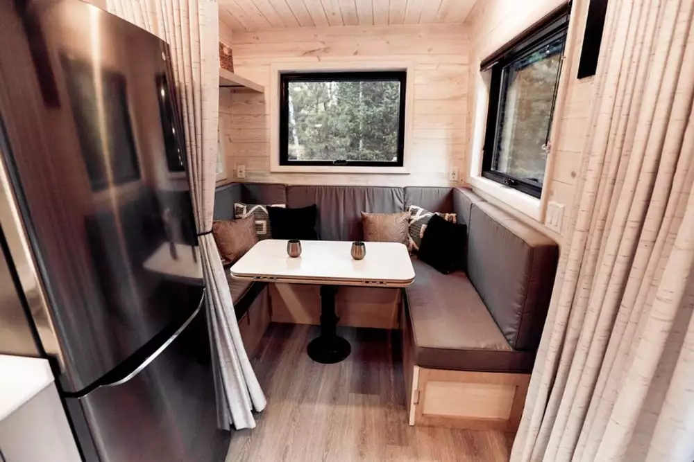 The Draper's living room includes a U-shaped sofa bed