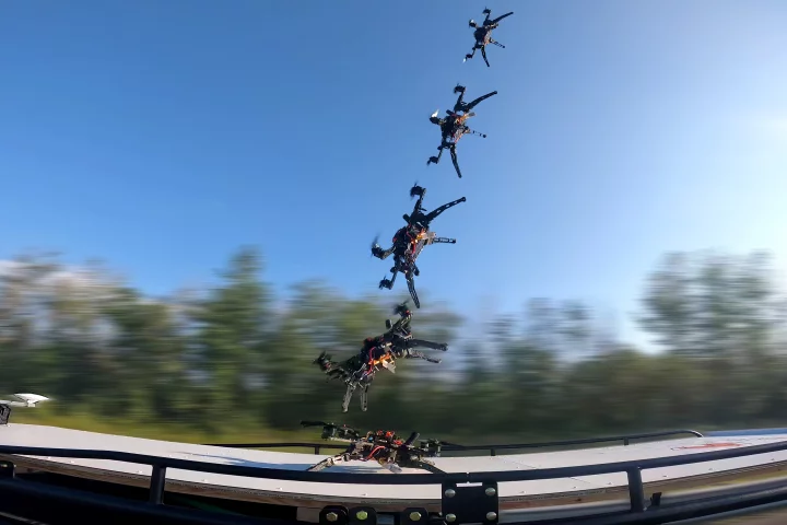 A multiple exposure of the DART drone, hitting a platform on the back of a pickup truck at almost 70 mph