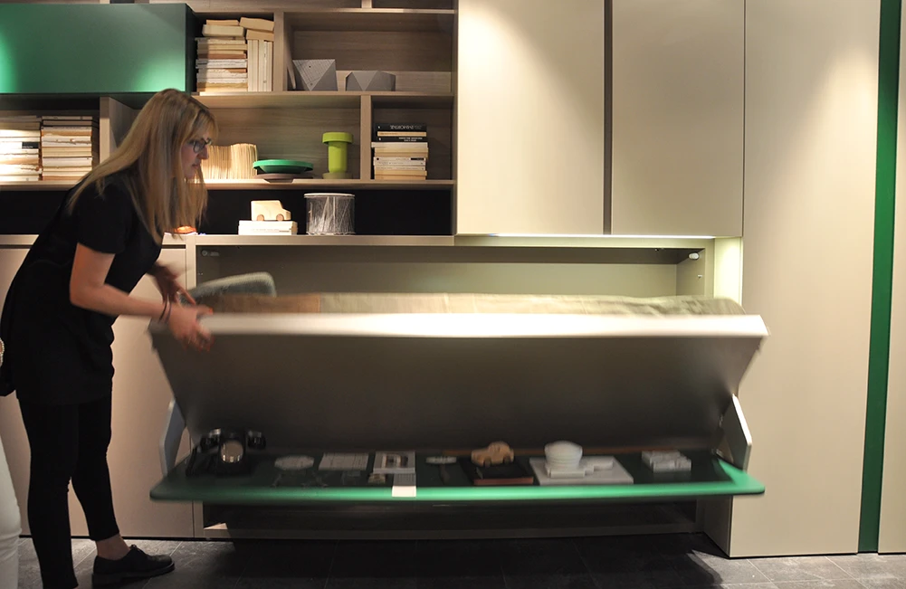 The table top remains horizontal at all times, meaning there is no need to remove items from top when folding down the bed