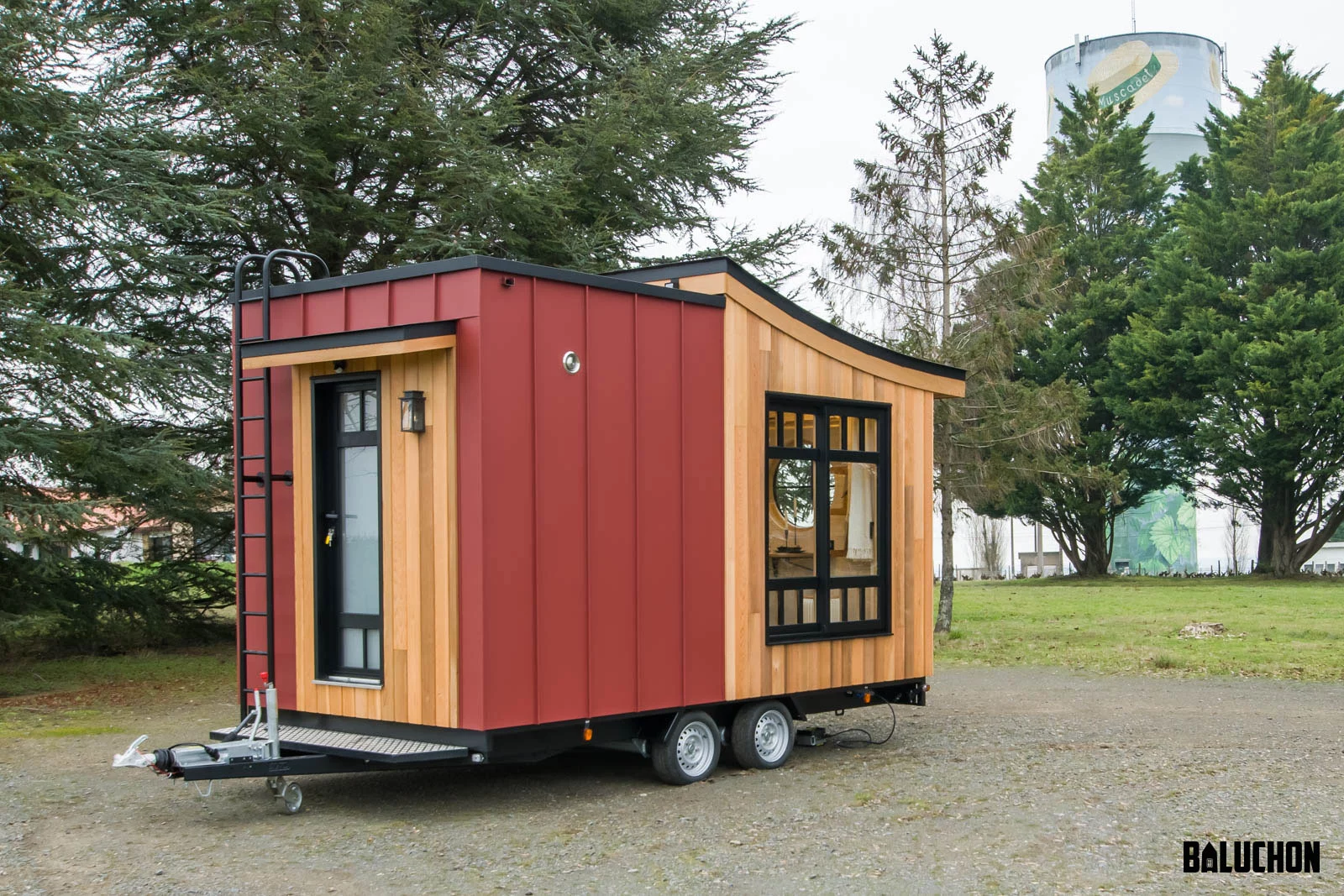 The Bonzai tiny house is accessed through a door situated at rear of the home
