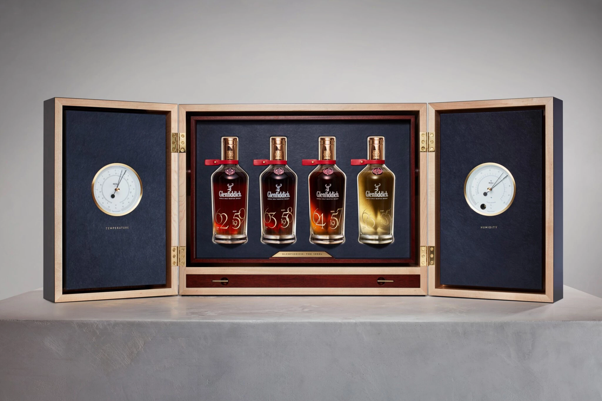 This four-bottle 1950s Glenfiddich Collection is a "one-off collection from the last four remaining casks of Glenfiddich distilled in 1955, 1957, 1958 and 1959." It sold for £1,037,500 ($1,375,621) at Sotheby's on 3 December 2021