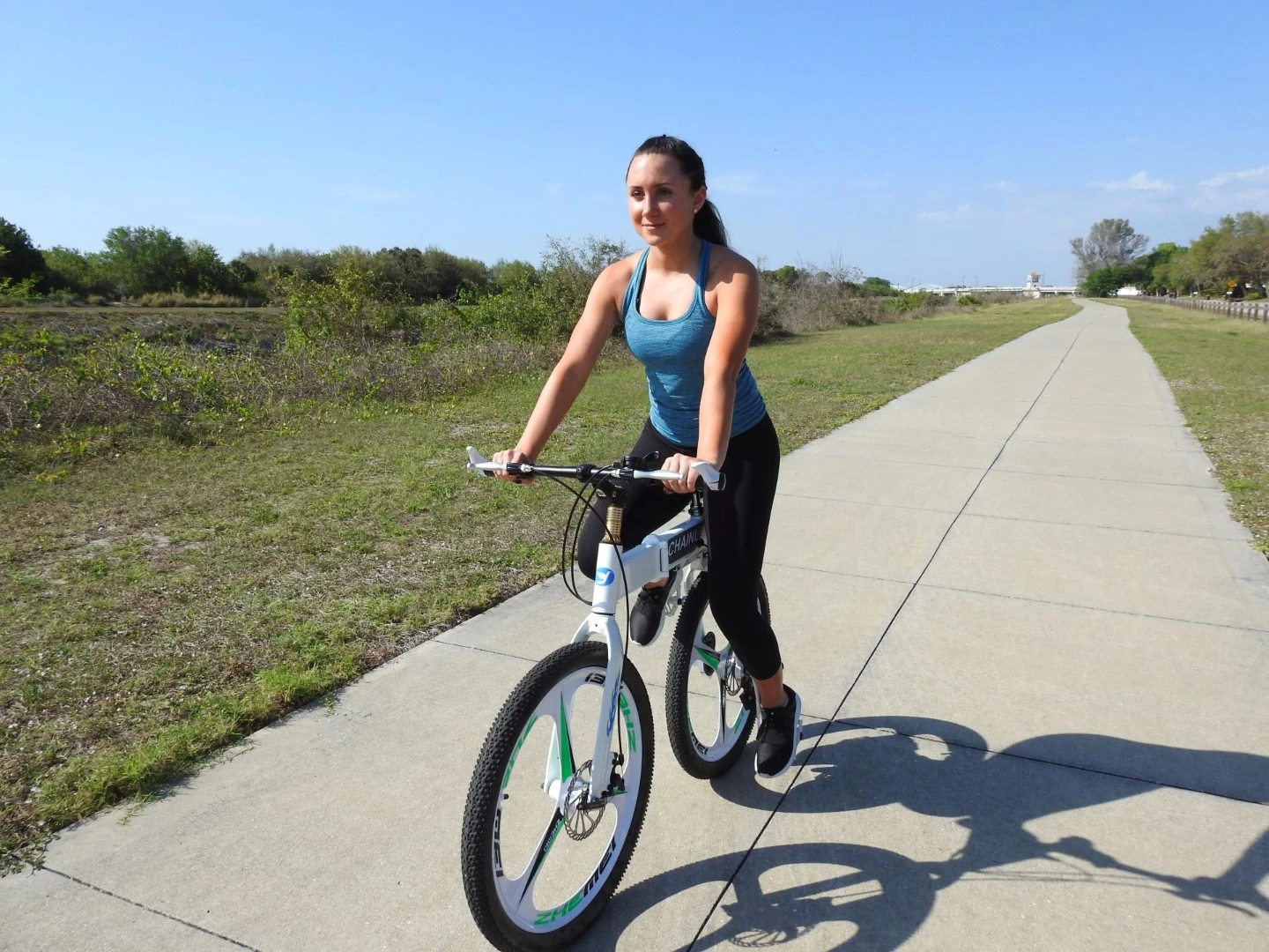 The Chainless Bike features a riding position in which the cyclist doesn't sit in the middle of the bike, but is instead perched over its back wheel