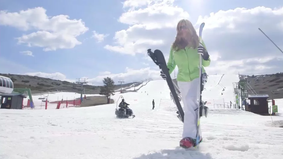 The SkiTaker system allows users to clip the bottoms of the skis onto the sides of their boots