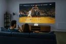 Whether you're watching the game or playing one, Optoma's compact UST projector brings the big screen to small spaces