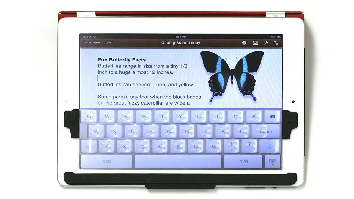 TouchFire is a transparent, silicone screen top keyboard for the iPad's virtual keyboard, that gives users the feel of raised keys as they type
