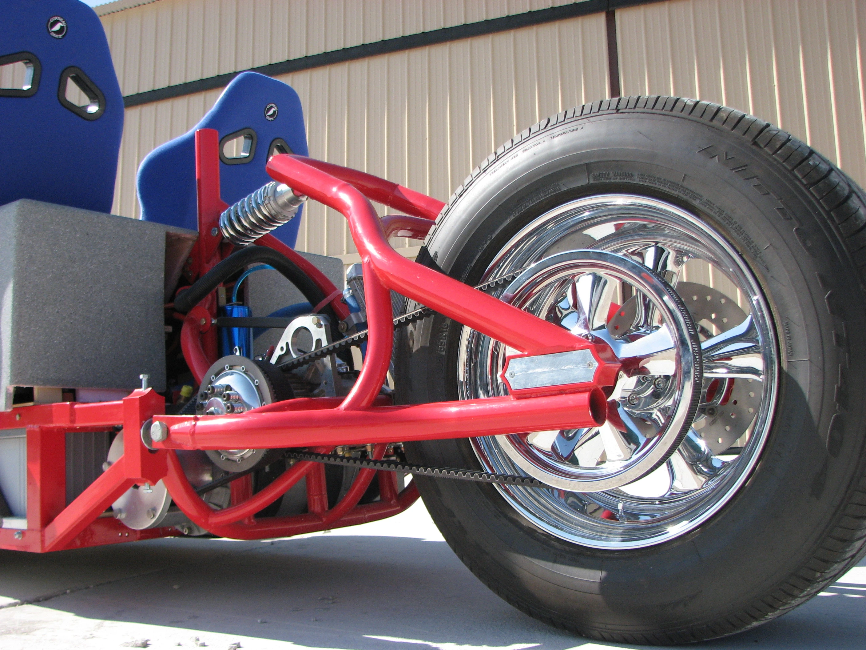 The original Z Wheelz 2-seat Custom features a MES-DEA 200-250 AC induction electric motor driving a belt to the rear wheel and a built-in computer with GPS functionality that displays system status information