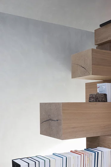 The timber beams also create bookshelves and other storage spaces